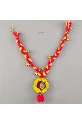 Braided red and yellow ethnic pendant