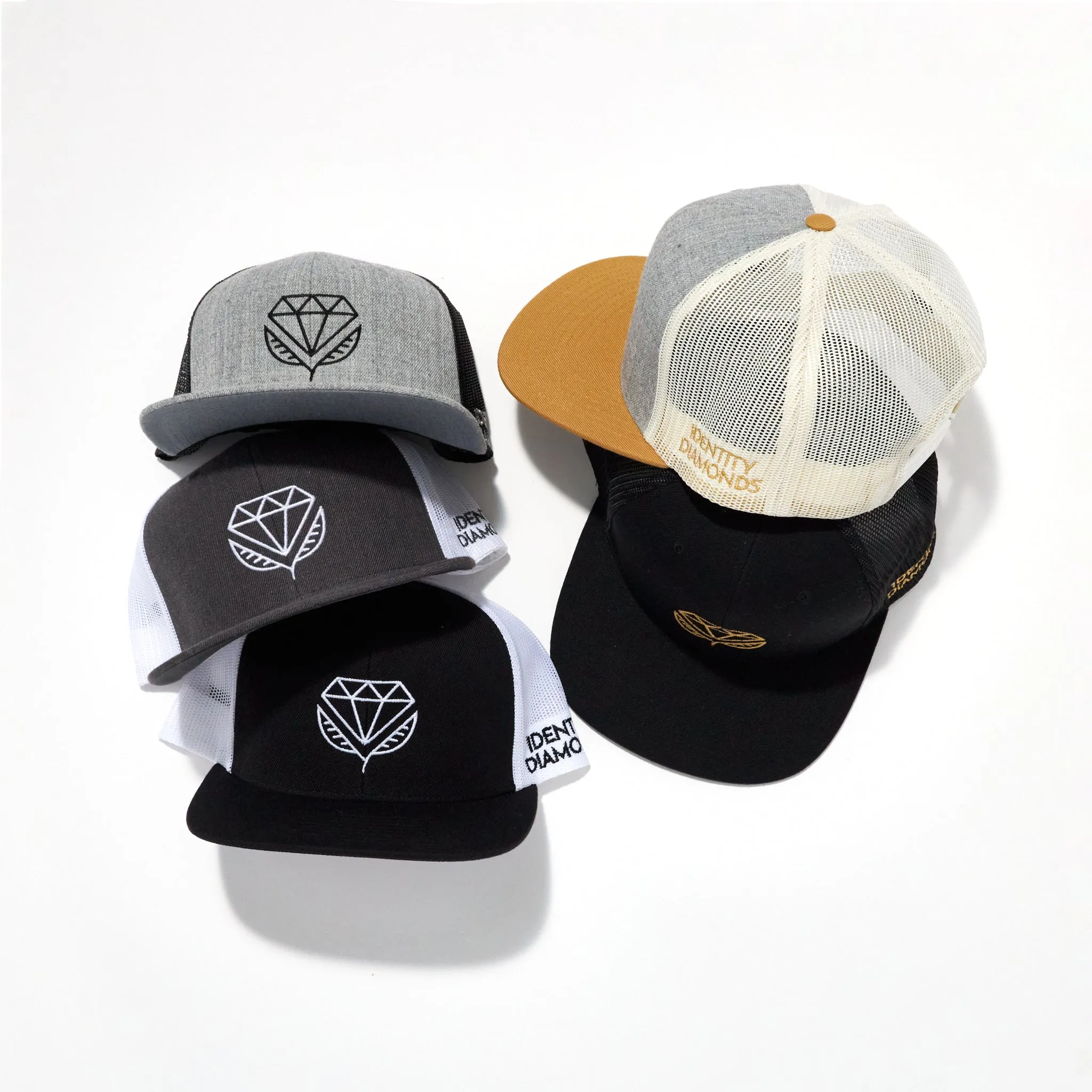 Identity Diamonds Embroidered Trucker Hat