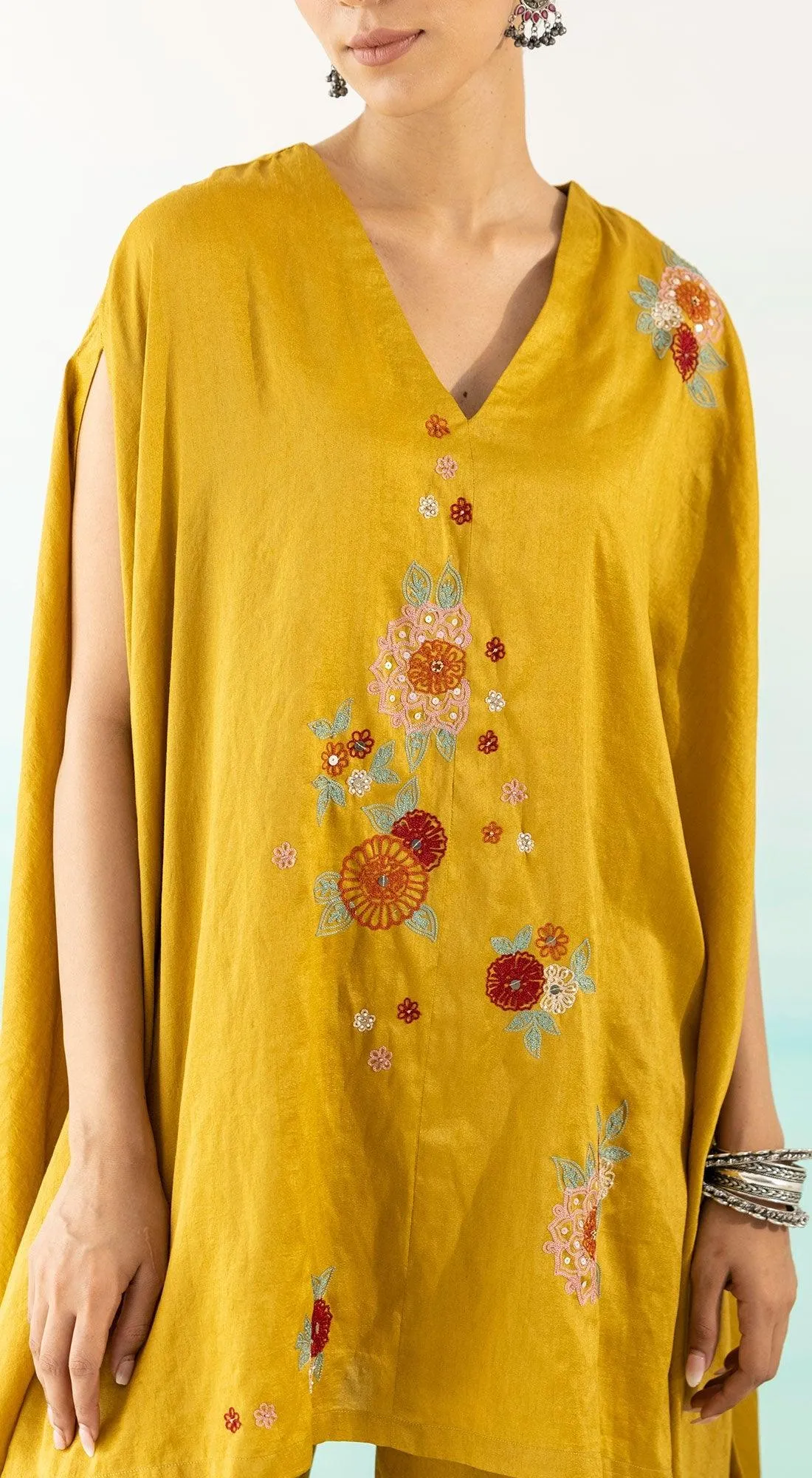 Yellow Embroidered Asymmetric Kurta And Pants