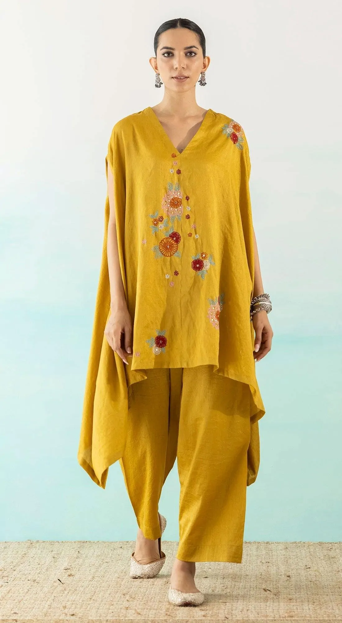 Yellow Embroidered Asymmetric Kurta And Pants